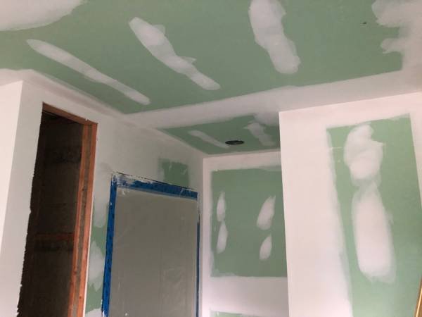 drywall taping in a bathroom